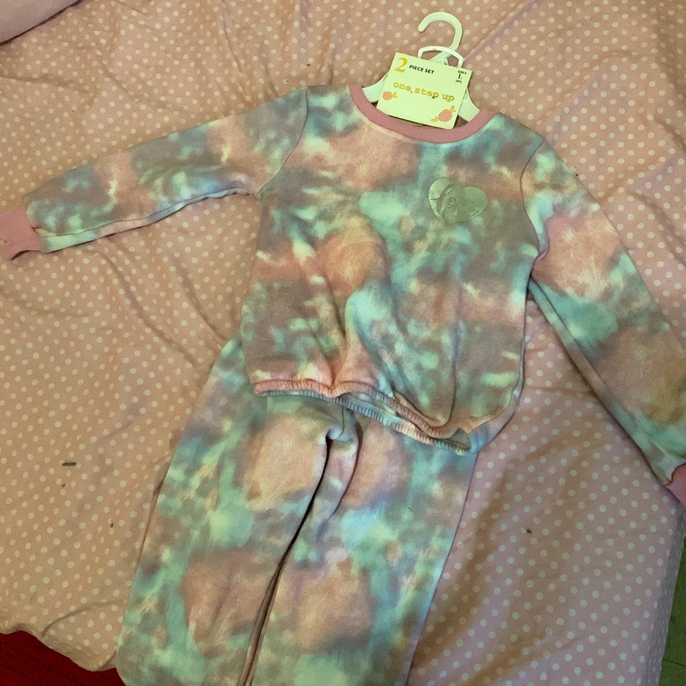 New Chic Floral 2pc. Pink, purple and blue never been worn.